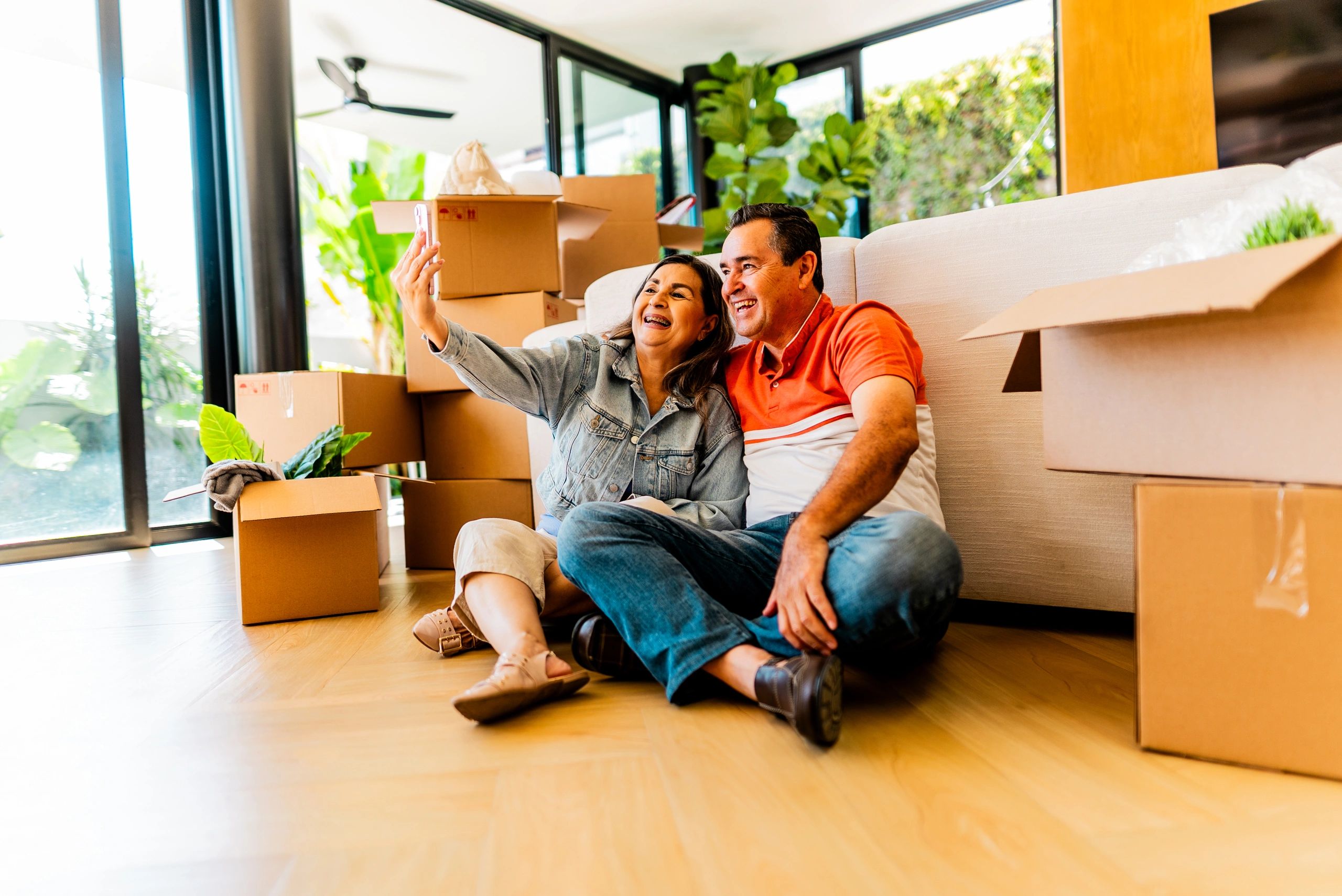 Happy homeowners celebrating a new home
